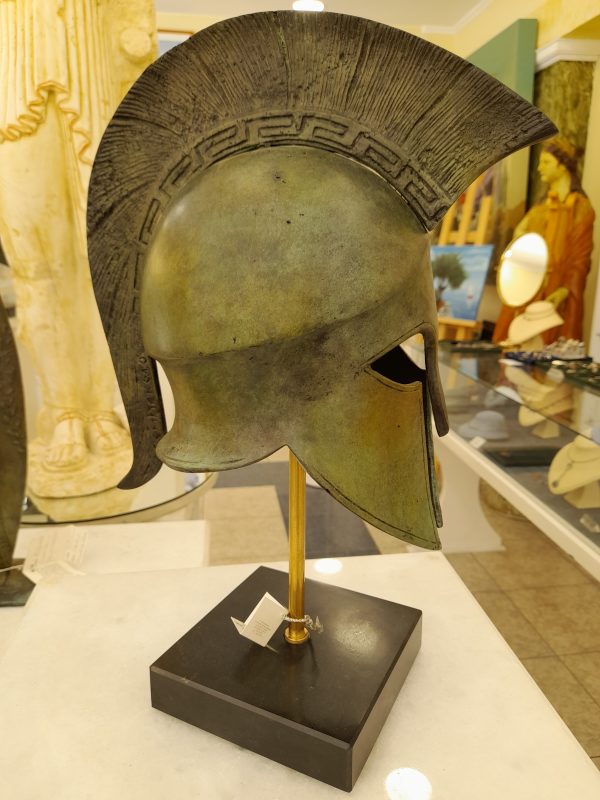 Bronze-Spartan-helmet-with-Greek-pattern-on-crest-on-marble-base